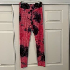 Pink and purple booty shaping leggings.